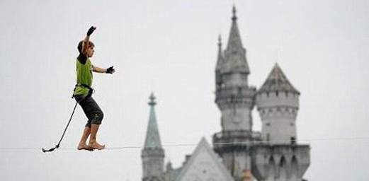 American Citizen Practices Walking on Highline at Window of the World