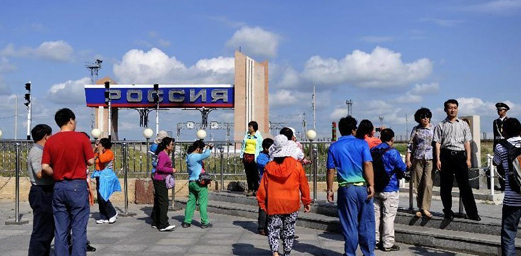 Tourists Visit Sino-Russian Border Gate in Manzhouli