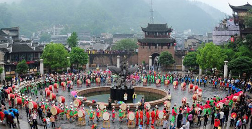 Miao People in Fenghuang Ancient Town Dances to Welcome Tourists